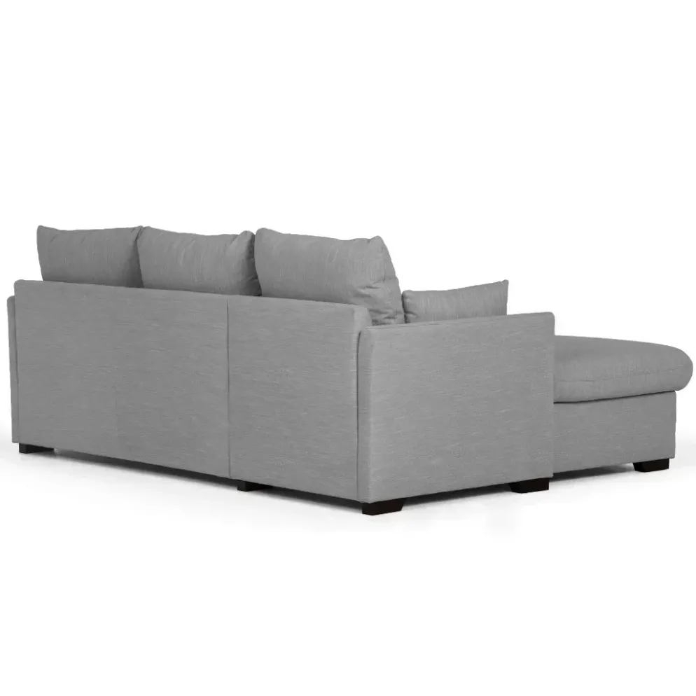 Sofá cama com chaise longue reversível, arrumação e almofadas decorativas