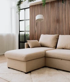 Sofá cama com chaise longue reversível, arrumação e almofadas decorativas